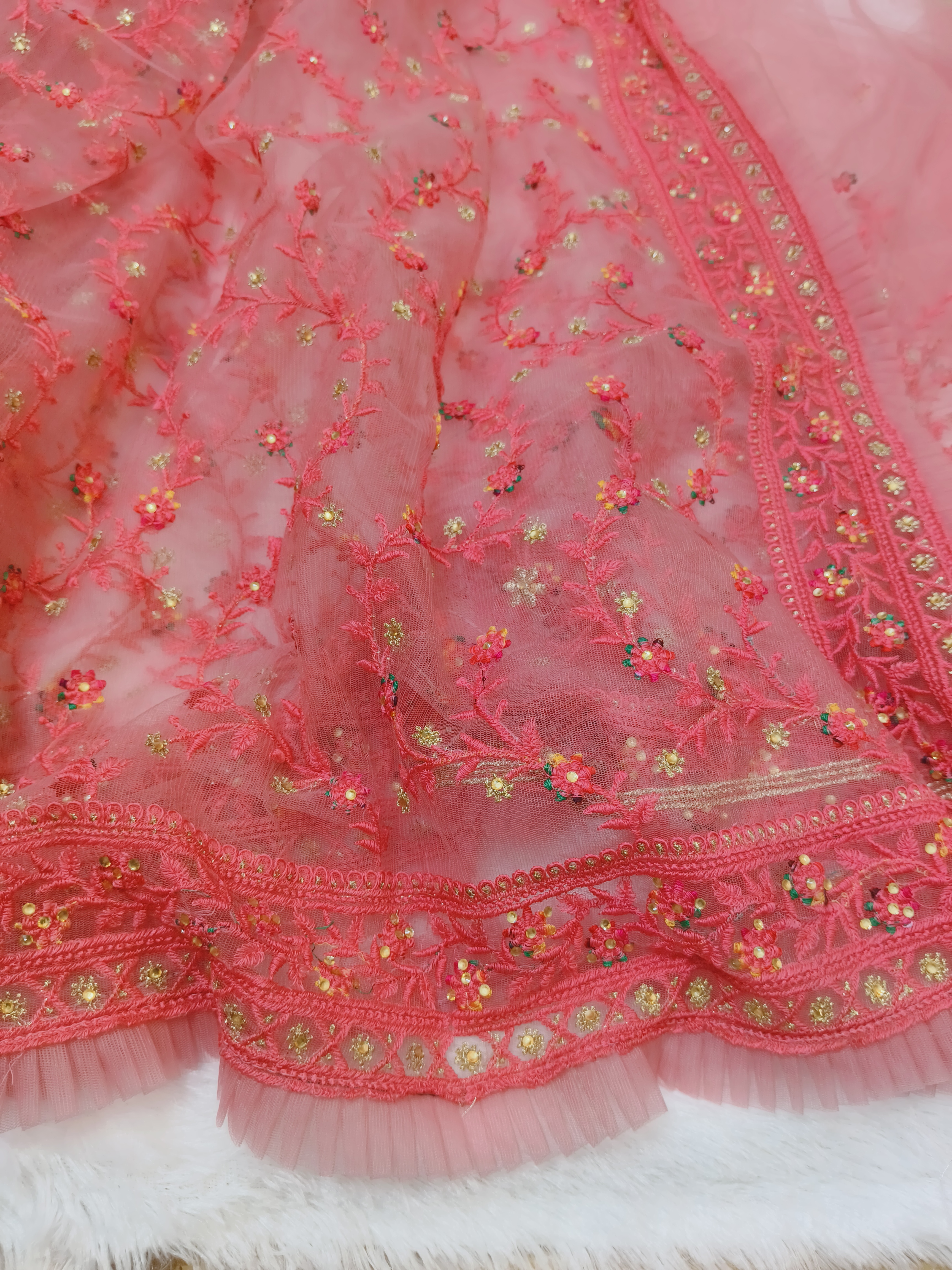 Coral Pink Netted Frill Saree with Floral Embroidery