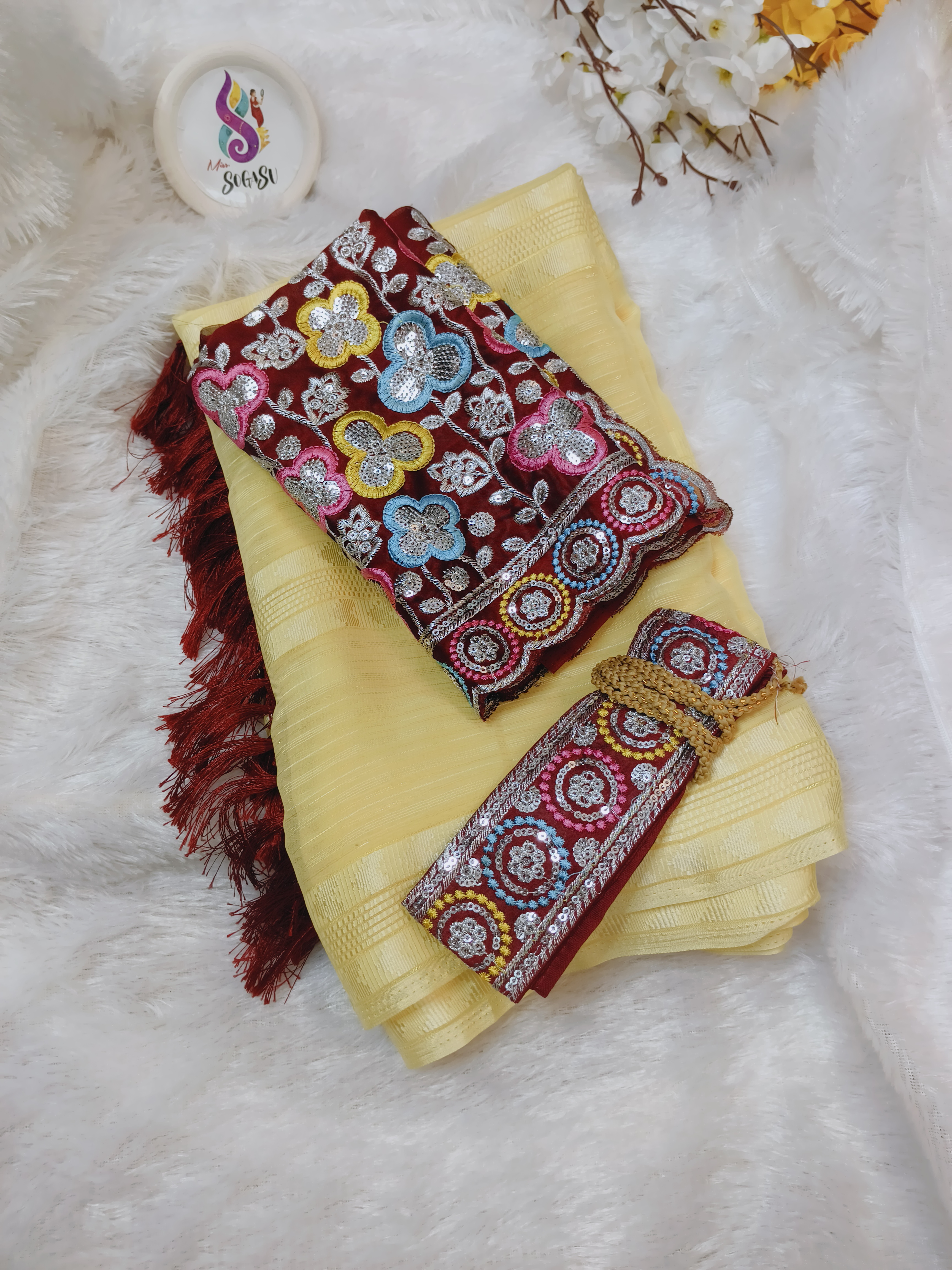 Light Yellow Georgette Saree with Multicolor Embroidered Blouse and Hip Belt