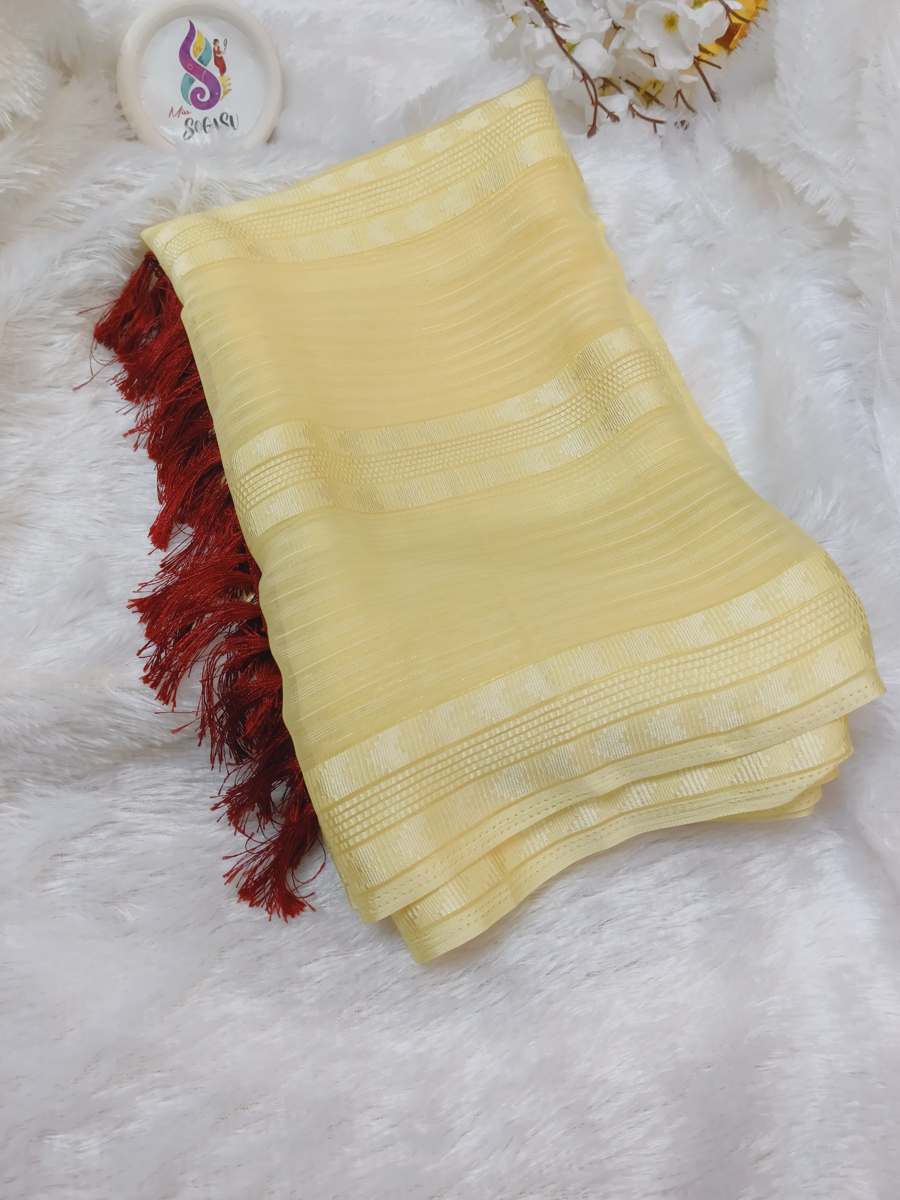 Light Yellow Georgette Saree with Multicolor Embroidered Blouse and Hip Belt