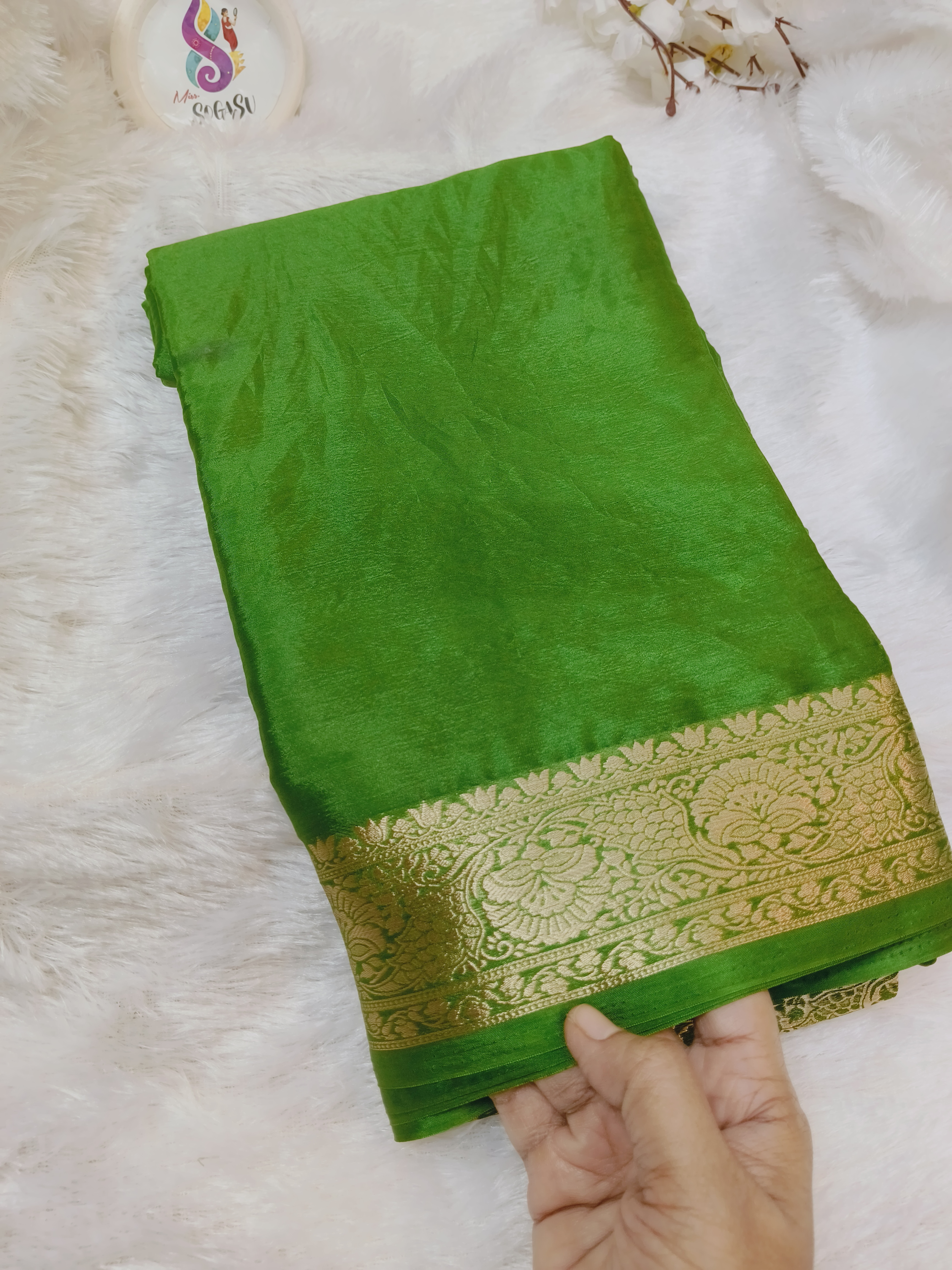 Parrot Green Viscose Georgette Saree with Zari Border
