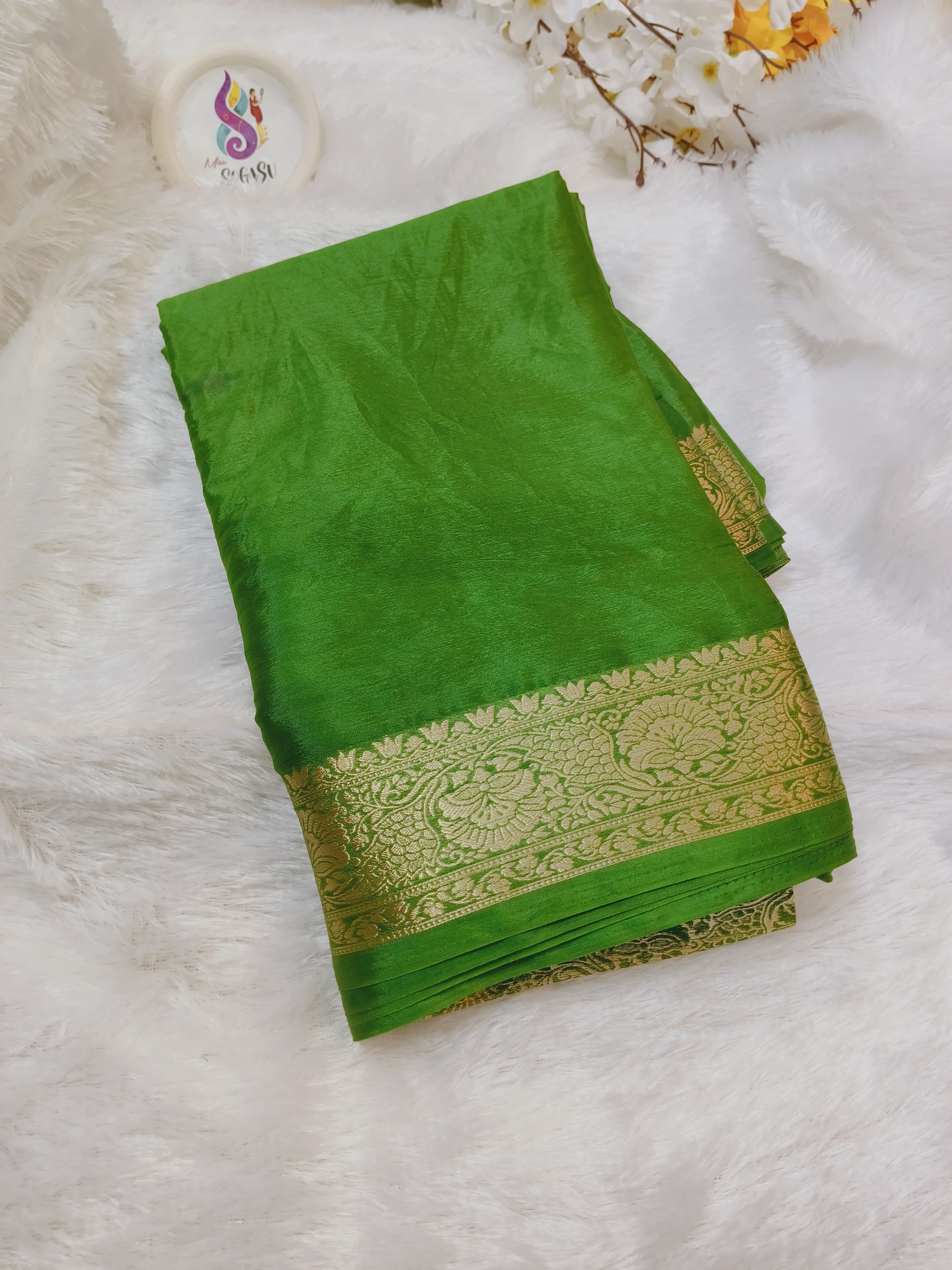 Parrot Green Viscose Georgette Saree with Zari Border