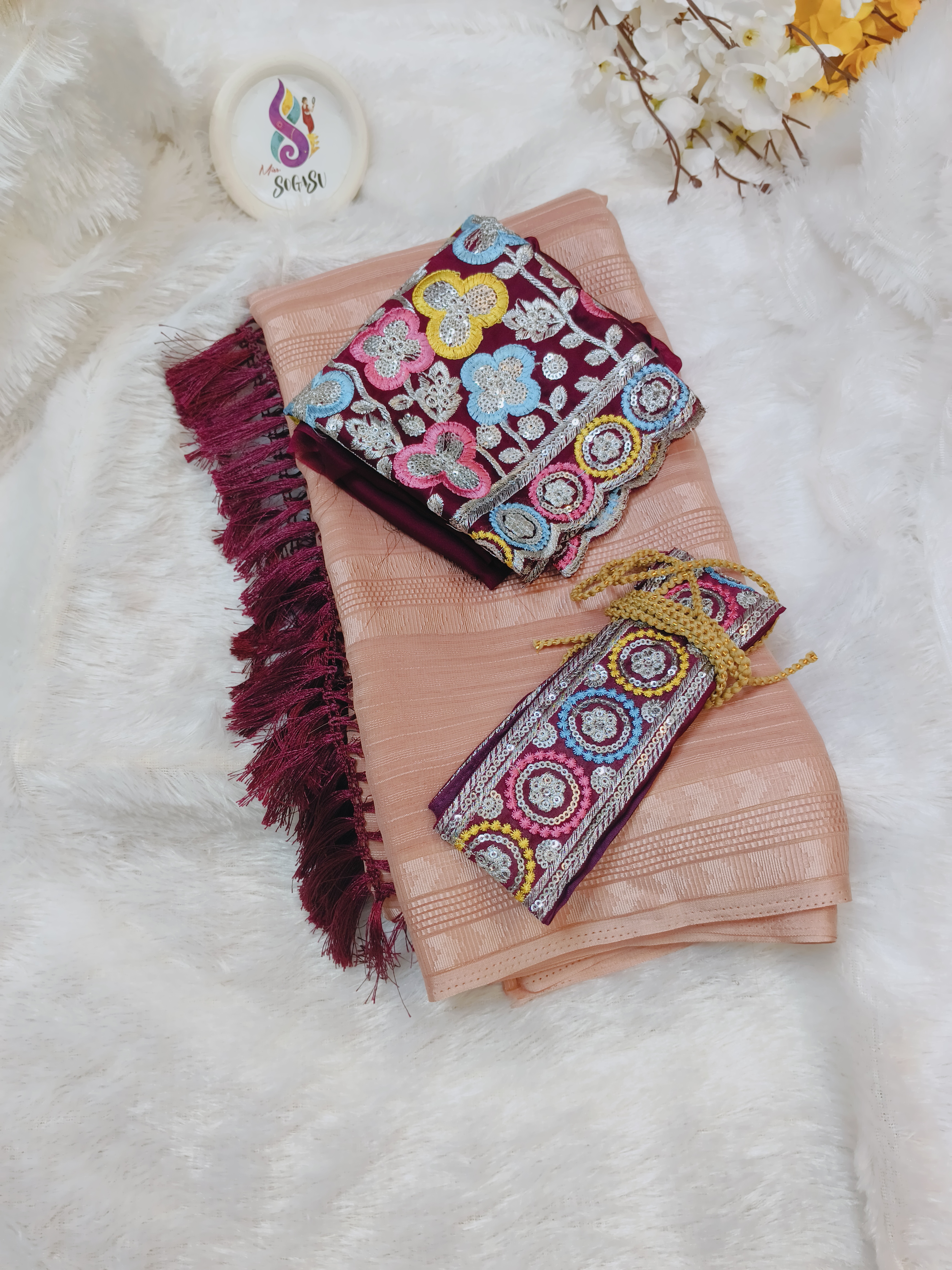 Peach Georgette Saree with Multicolor Embroidered Blouse and Hip Belt