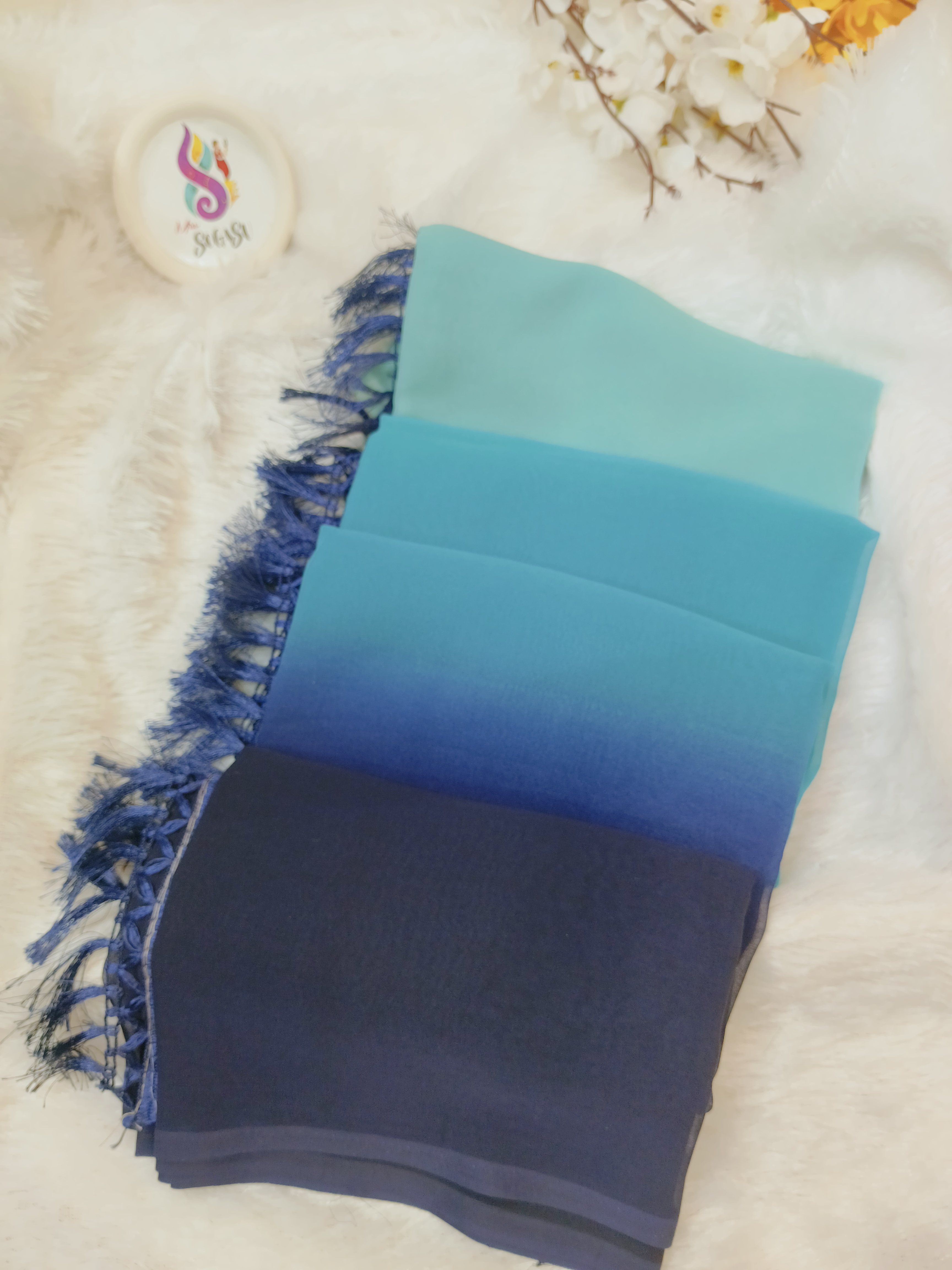 Teal Blue Georgette Saree with Floral Embroidered Blouse